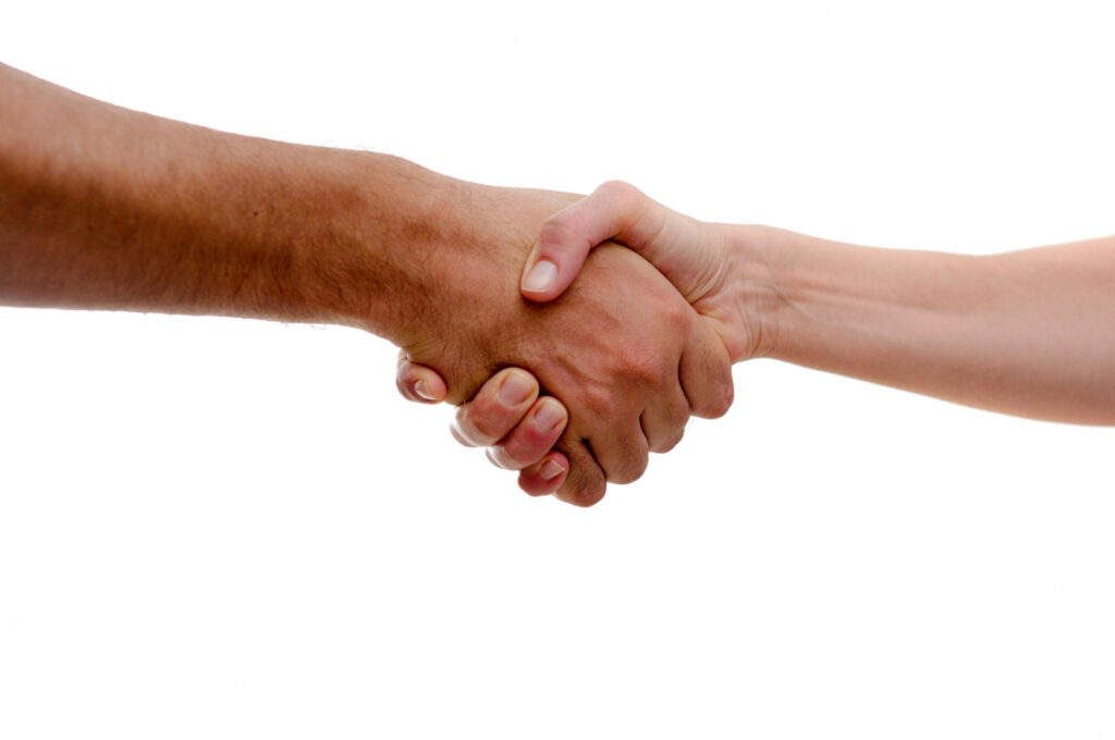 firm-handshake-greeting Firm handshake in greeting